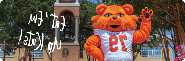 Mascot 山姆my Bearkat and the words Eat 'Em Up Kats